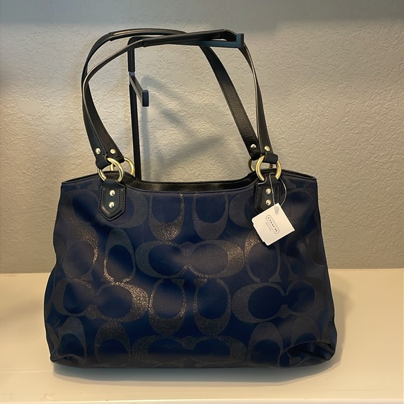 Coach purse, new with tags and bag.
Well kept, grab a good deal! - Picture 2 of 8